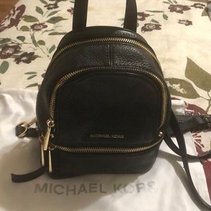 michael kors backpack is super cute!! with dustbag